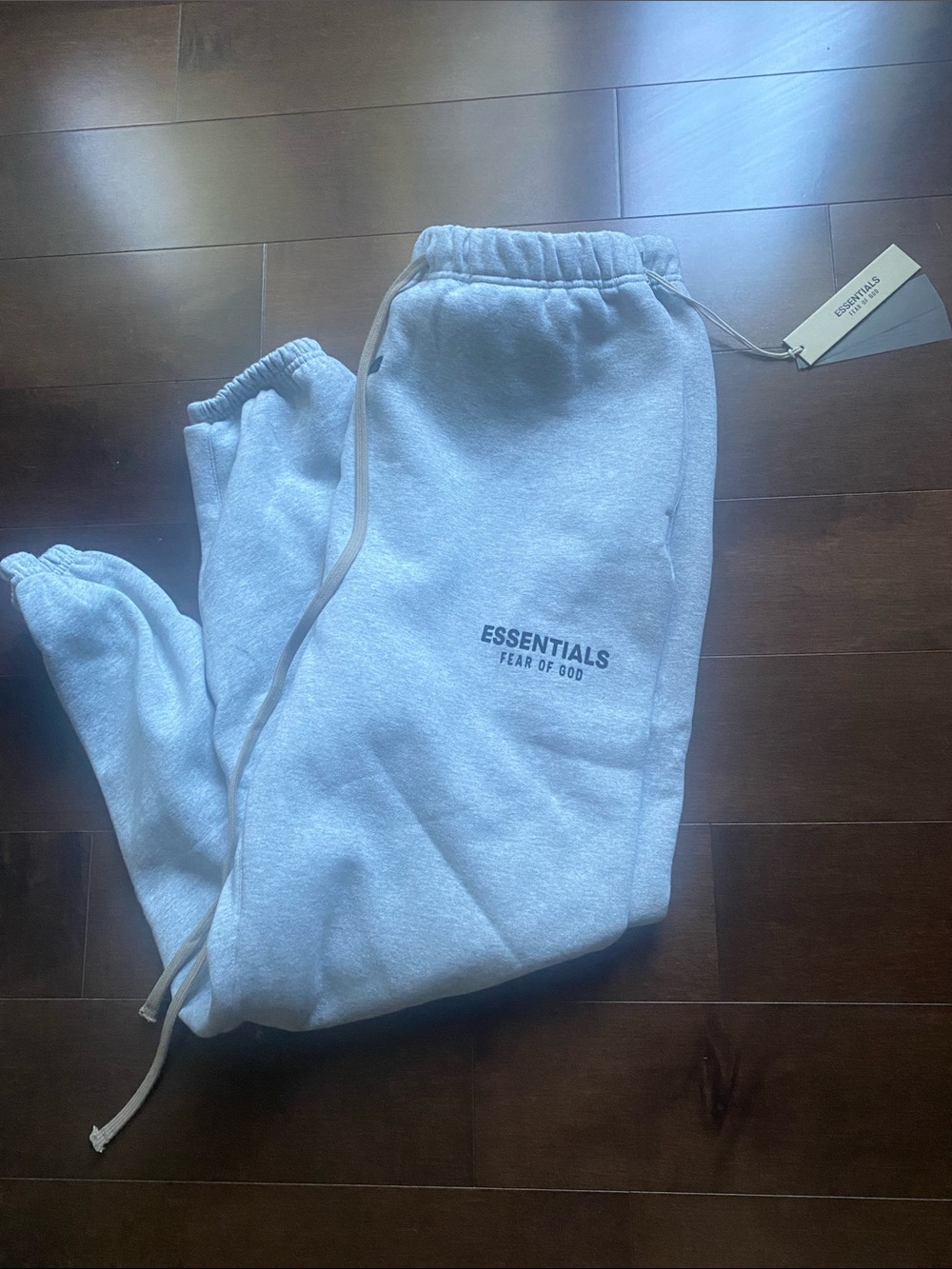 ESSENTIALS Sweatpants in Light Grey with Thigh Logo - Picture 1 of 4